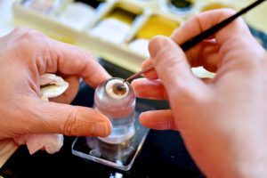 Handpainting lenses at No7 Contact Lenses